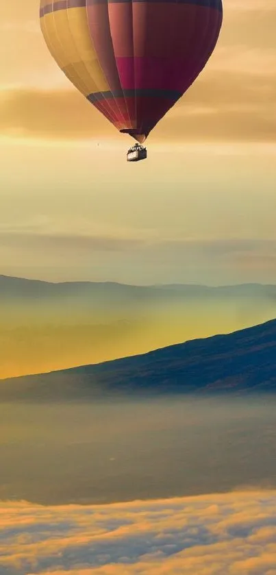 Hot air balloon floating over scenic sunrise landscape.