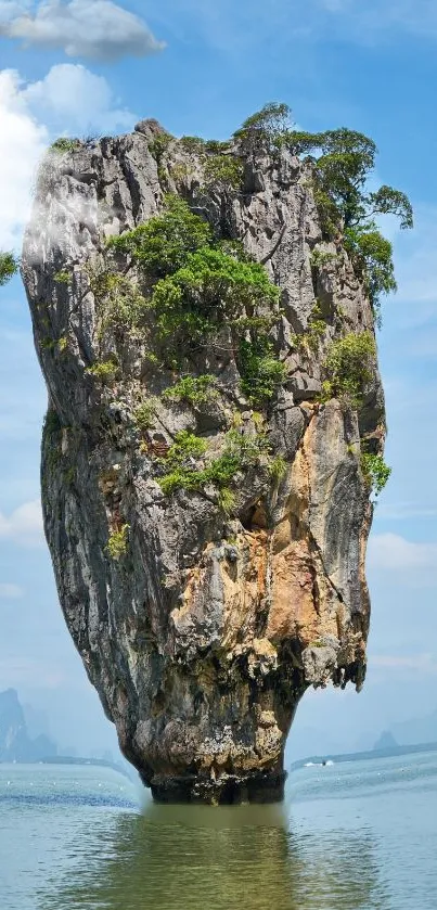 Majestic limestone island in tranquil blue waters under a summer sky.