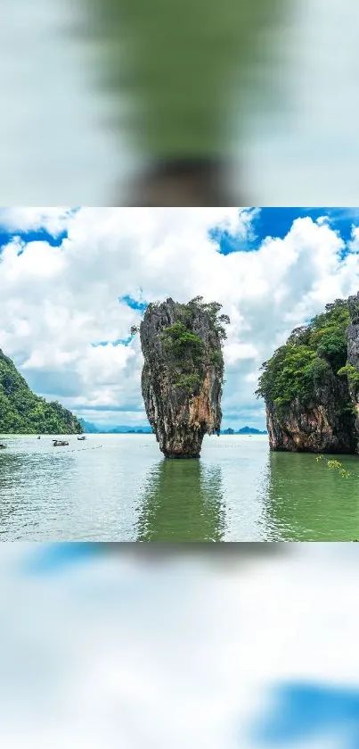 Scenic island with lush greenery and blue sky in stunning mobile wallpaper.