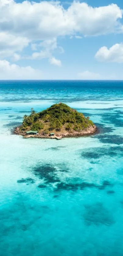 Aerial view of a lush island surrounded by turquoise ocean under a bright blue sky.