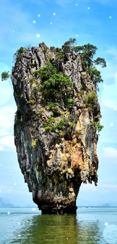 Mobile wallpaper of a striking island rock formation surrounded by blue sky.