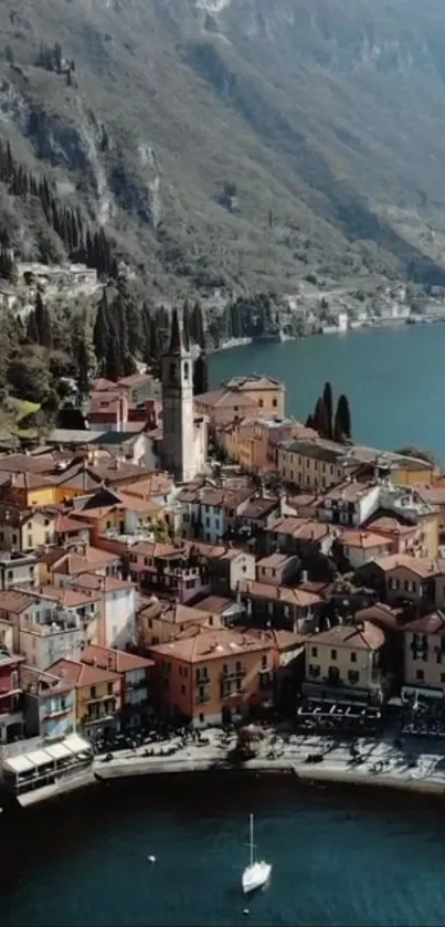 Aerial view of an Italian lakeside town with colorful buildings and blue waters.