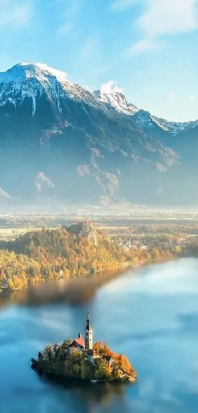 Serene alpine lake with snow-capped mountains under a clear blue sky.