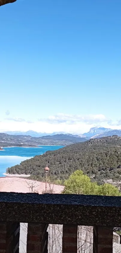 Scenic lake and landscape view through an archway.