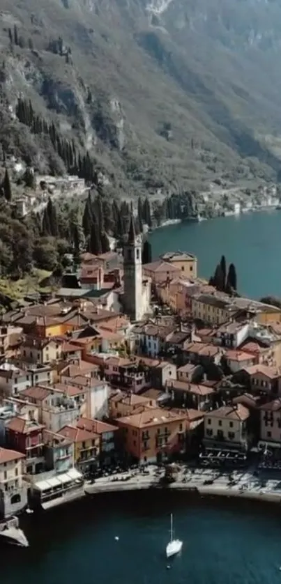 Aerial view of a colorful village by a tranquil lake.