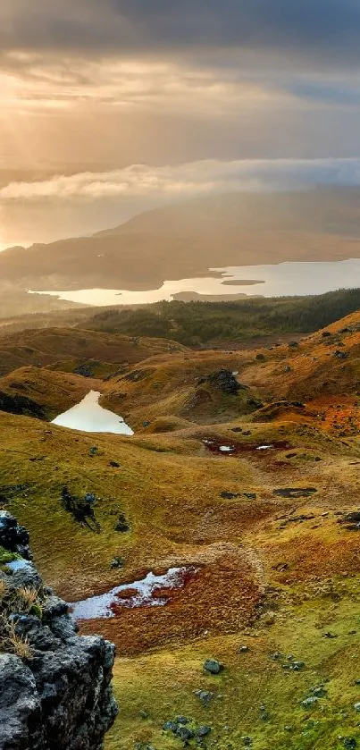 Scenic mobile wallpaper featuring hills under a golden sunset.