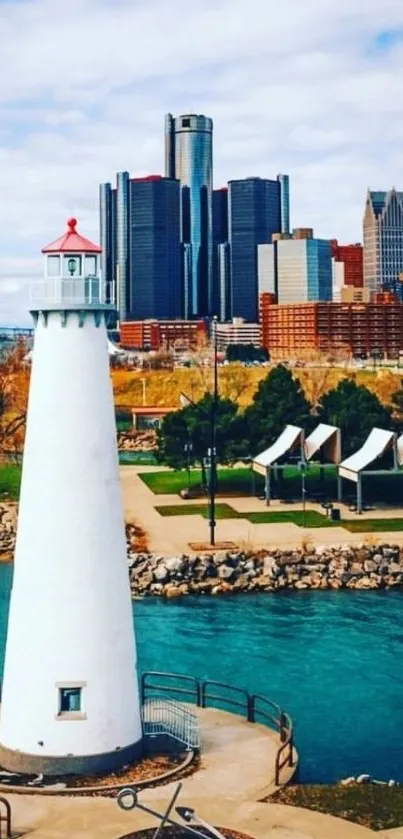 Lighthouse overlooking city skyline with blue waters and cloudy sky.