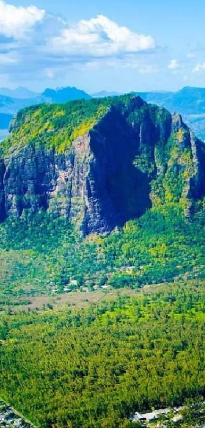 Aerial view of Mauritius island with turquoise waters and lush green landscapes.