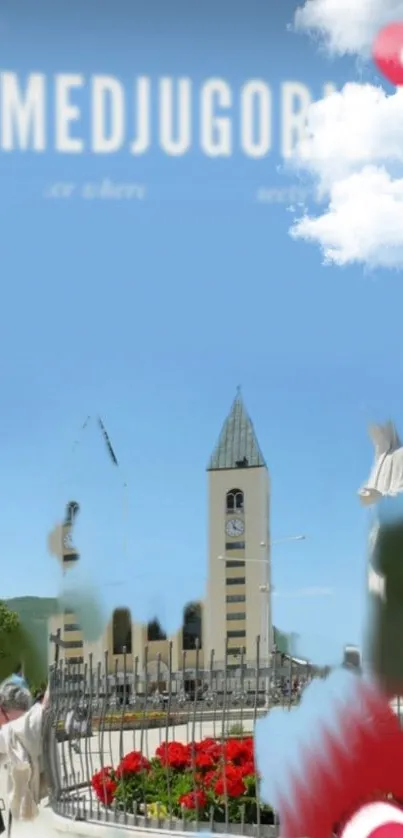 Scenic view of Medjugorje church under blue sky with vibrant flowers.