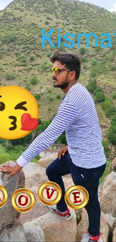 Man on rocks with mountain backdrop and fun emojis