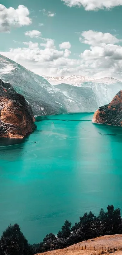 Serene mountain lake with vivid teal waters and rugged peaks.