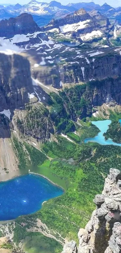 Breathtaking mountain view with blue lakes and lush greenery.