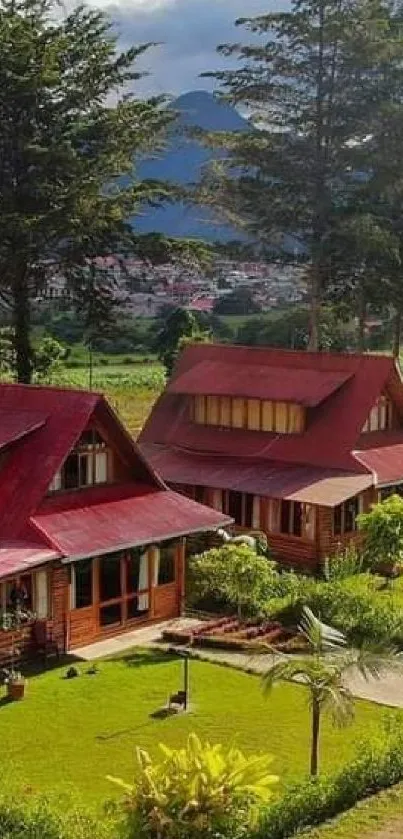 Mountain cabins surrounded by lush green trees and a scenic village landscape.