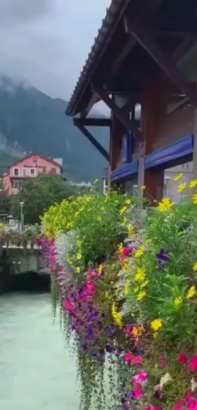 Scenic view of vibrant flowers by a mountain river.