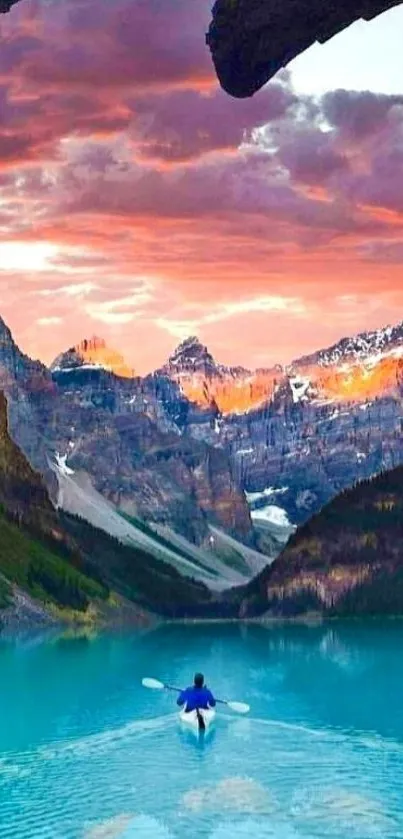 Kayaker on turquoise lake with mountain view at sunset background.