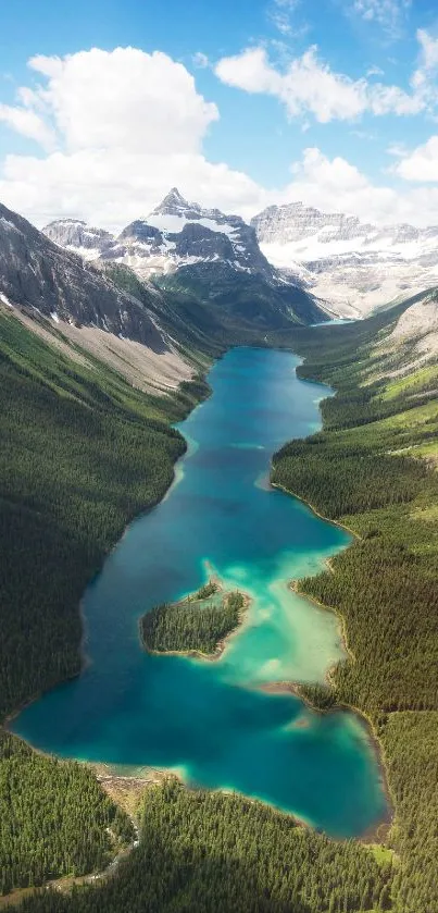 A breathtaking view of a tranquil lake surrounded by mountains and lush greenery.