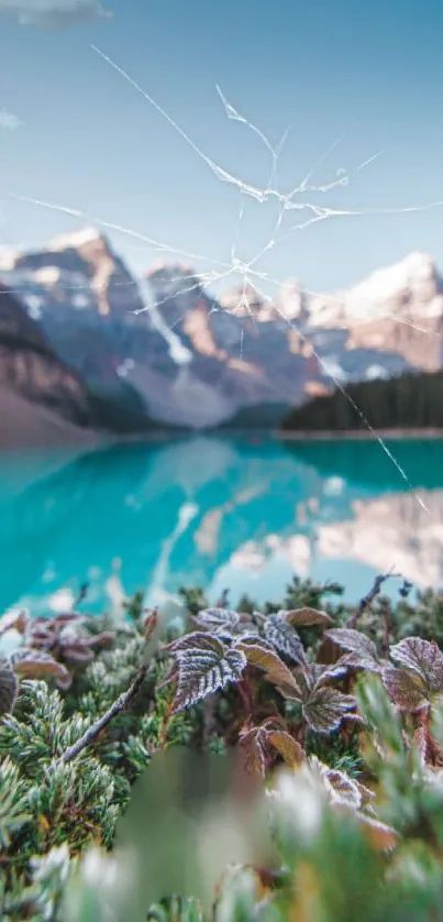 Scenic view of a mountain lake with greenery and snow-capped peaks.