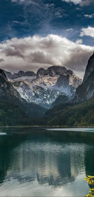 Serene mountain lake scene with dramatic sky and reflections.