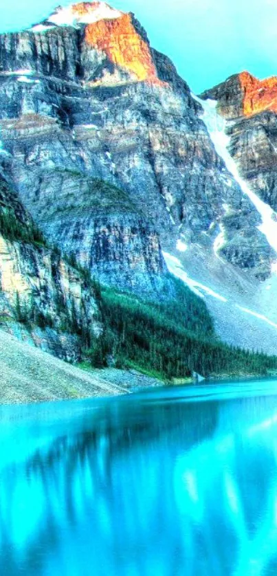 Scenic view of a turquoise mountain lake with rocky peaks.