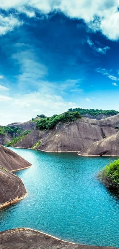 Scenic mountain lake with blue waters and rocky landscapes.