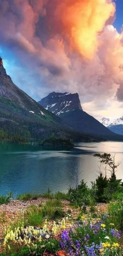 Serene mountain lake with vibrant sunset sky.