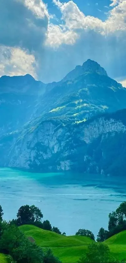 Serene mountain lake with blue sky and greenery.