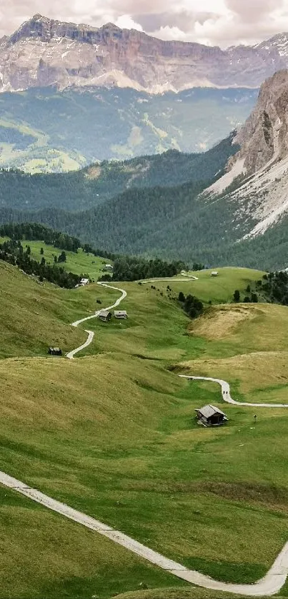 Winding road through lush green mountains with scenic view.