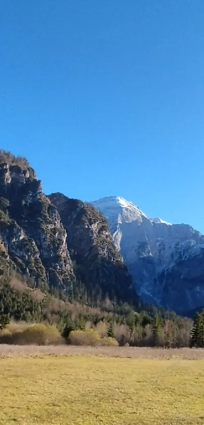 Scenic mountain landscape with clear blue sky.