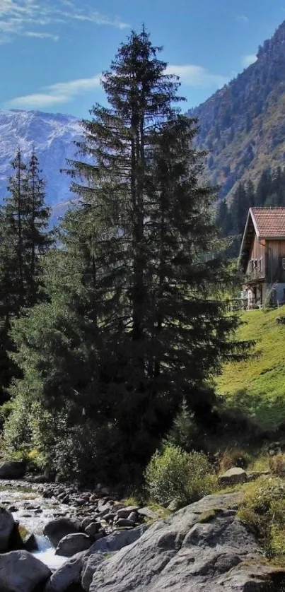 Rustic cabin by mountain stream in lush green landscape.