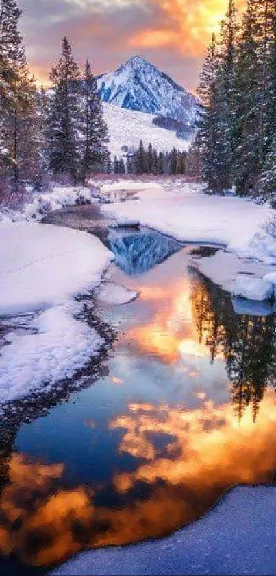 Mountain river reflecting sunset in winter snow scene.