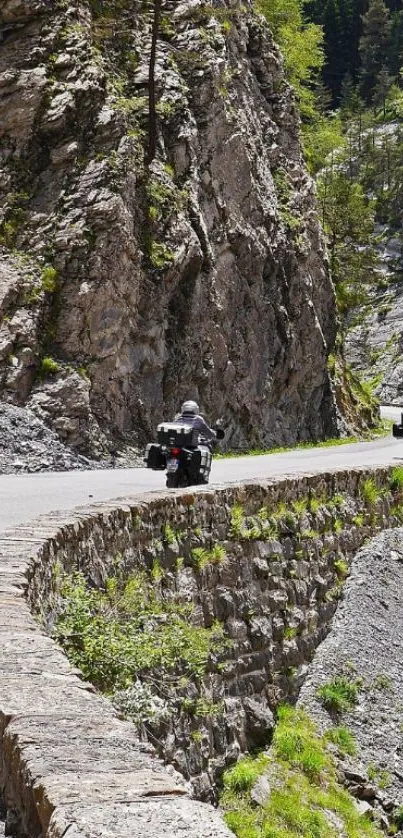 Motorbikes on winding mountain road wallpaper.