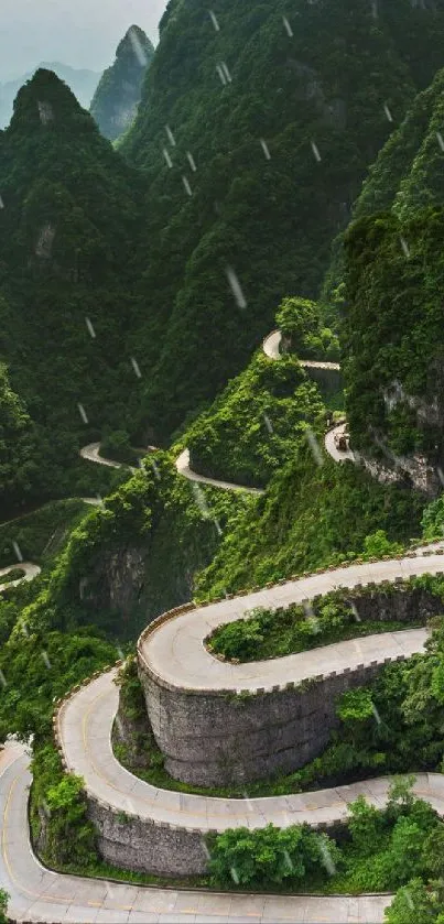 Winding mountain road with lush green scenery.