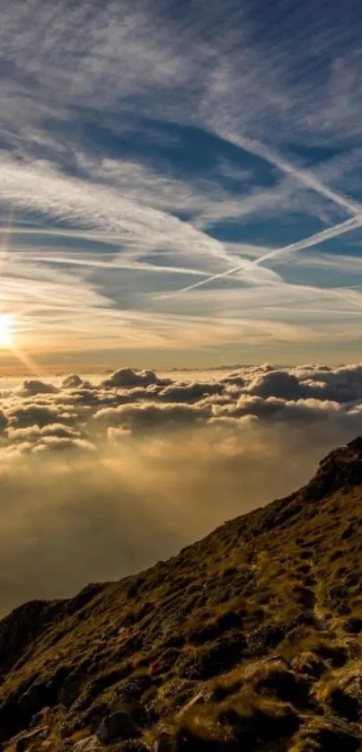 Stunning sunrise over mountain with clouds and vibrant sky.