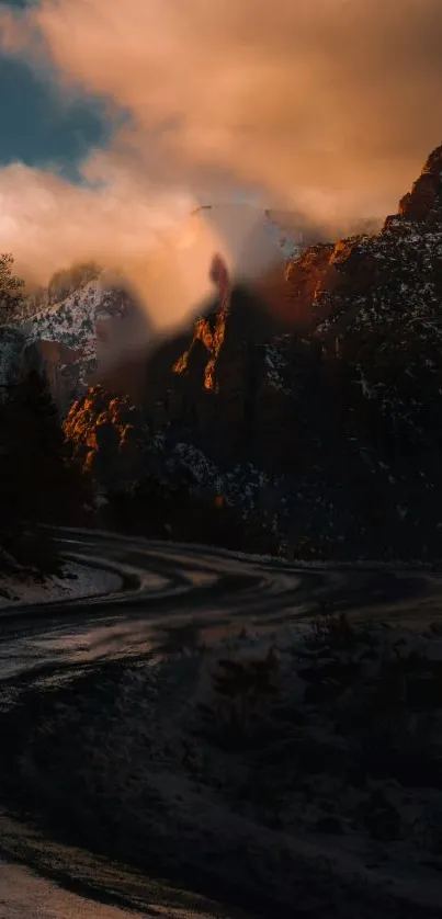 A breathtaking mountain landscape at sunset with a winding road and glowing peaks.