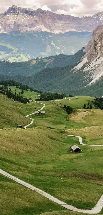 A winding path through a lush, green mountain valley.