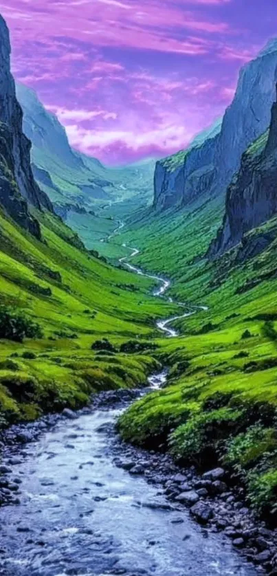 Scenic mountain valley with river and vibrant sunset.