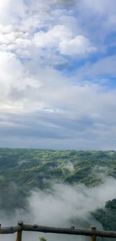 Scenic view of mountains with clouds and blue sky in the background.