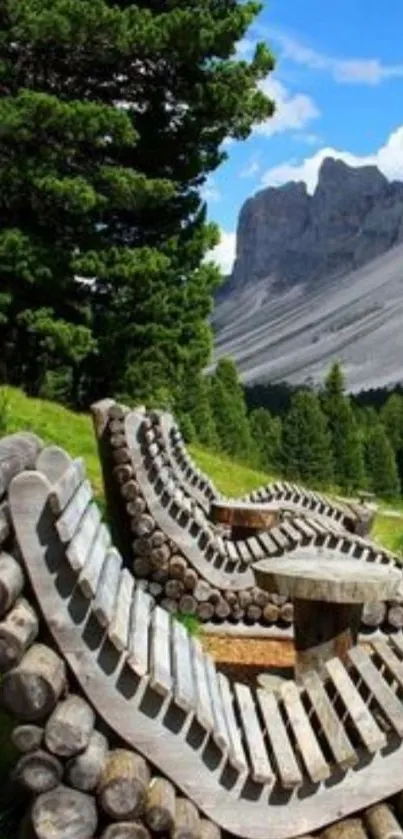 Rustic wooden benches with a scenic mountain view and lush greenery.