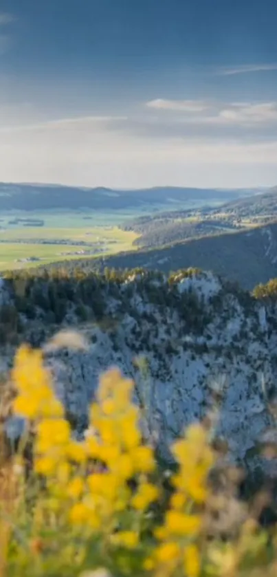 Scenic mountain landscape with valleys and a vibrant sky.