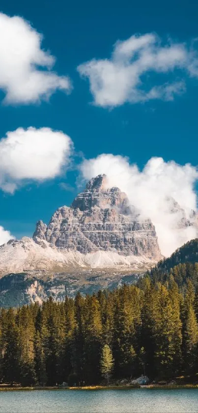 Scenic mountain and forest under blue sky.