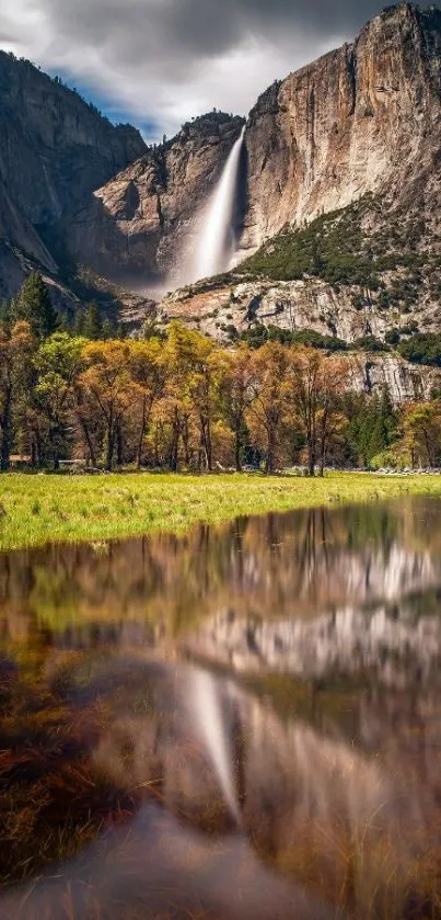 Scenic mountain waterfall with clear reflections in a serene landscape.