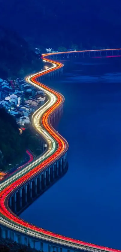 Scenic night road alongside a blue river.