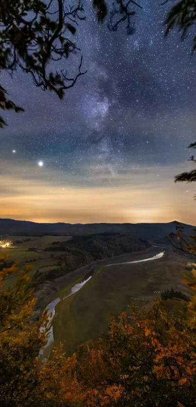 Beautiful starry night over scenic landscape with river.