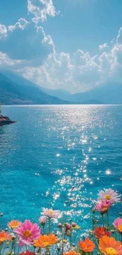 Ocean view with vibrant flowers under a clear blue sky.