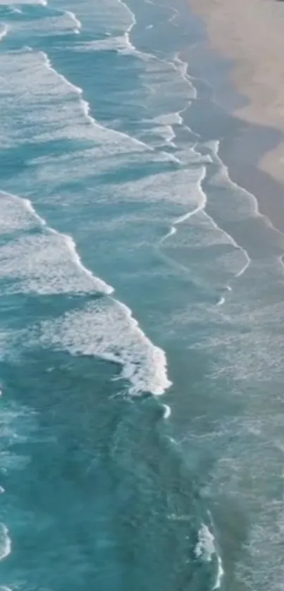 A scenic beach wallpaper with gentle ocean waves along a sandy coastline.