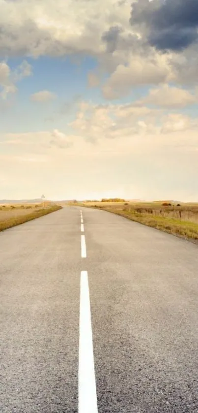 Open road under cloudy sky wallpaper.