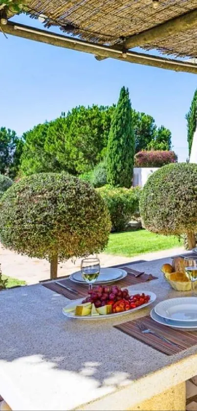 Scenic outdoor dining area with lush greenery and colorful flowers.