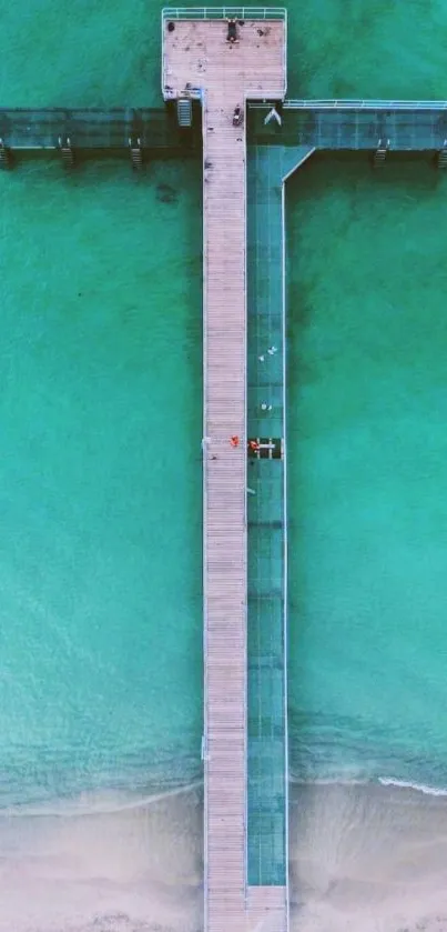 Aerial view of a wooden pier over turquoise water, ideal for mobile wallpaper.