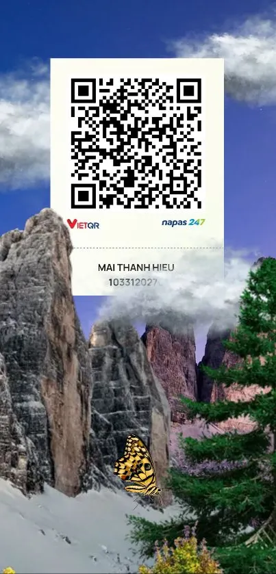 Scenic mountain with QR code overlay and blue sky.