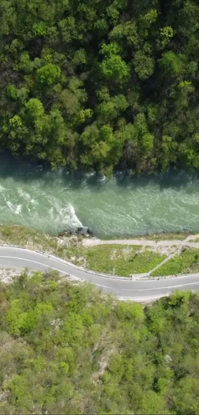 Aerial view of a scenic river flowing through a lush forest with winding road.